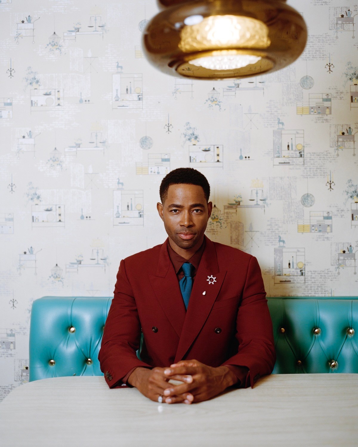 Jay Ellis wears a Martin Katz Lapel Pin (Photographed by Daniel Jack Lyons for Only Natural Diamonds)