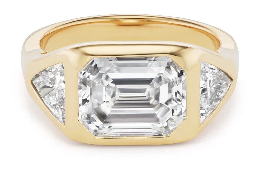 three stone ring with trillion cut diamond side stones