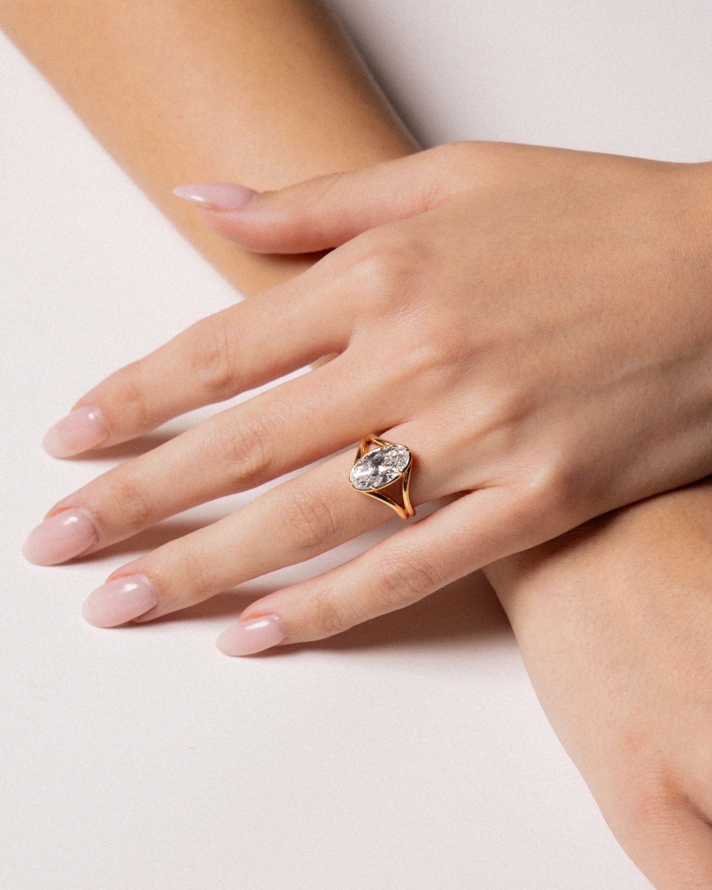 split shank engagement rings: split shank engagement ring with oval diamond