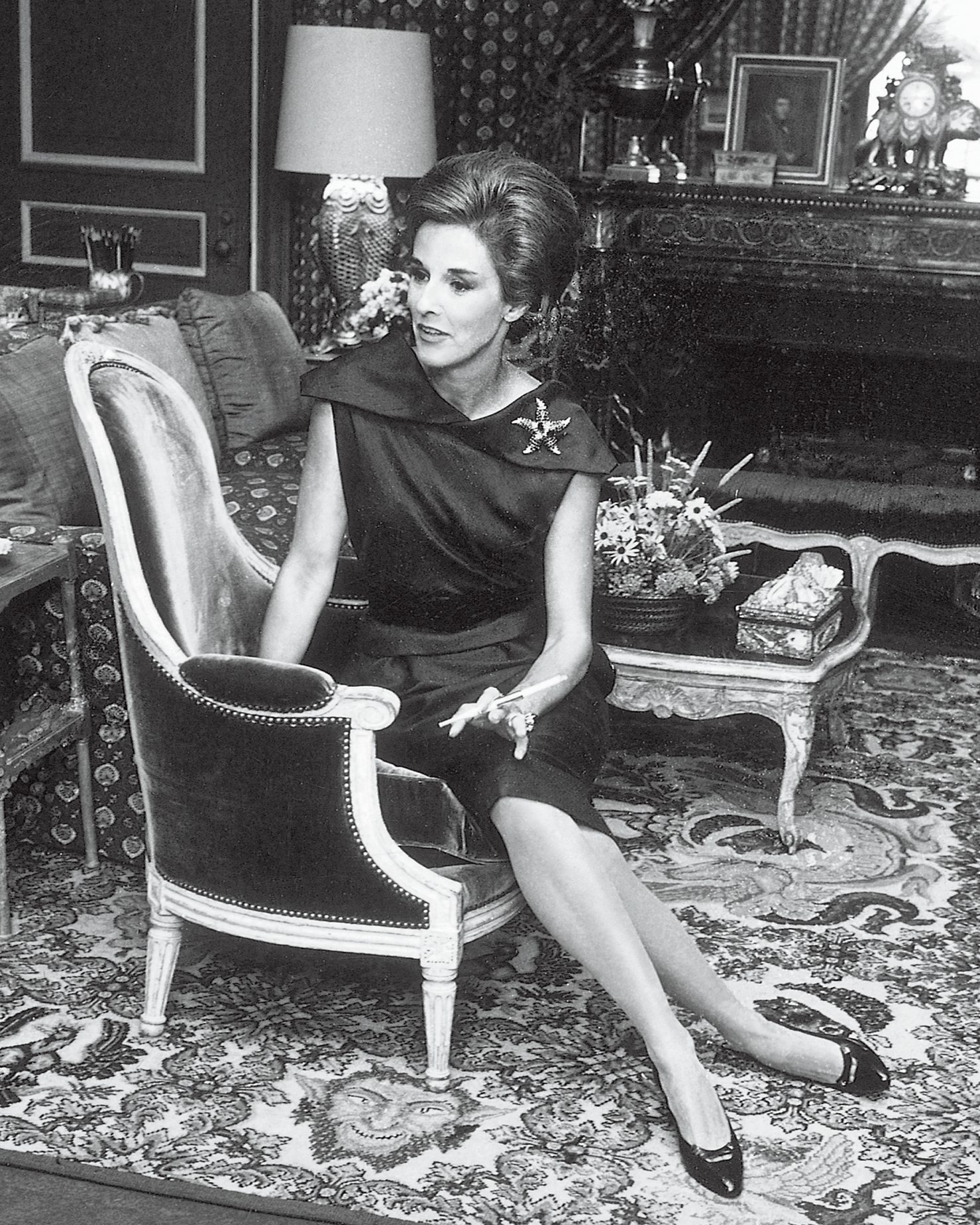 Babe Paley photographed at her home in New York, wearing a Tiffany & Co. starfish brooch designed by Jean Schlumberger. (Getty Images)