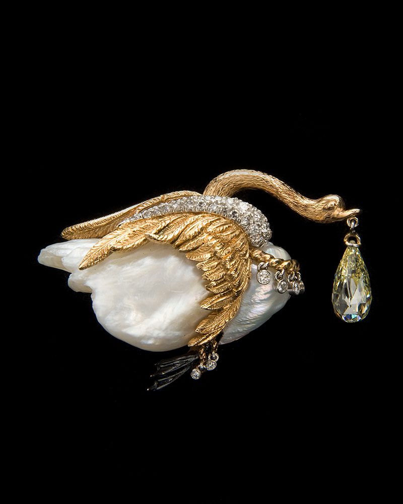animal jewelry: Babe Paley's Verdura Swan Brooch with Hanging Diamond Briolette