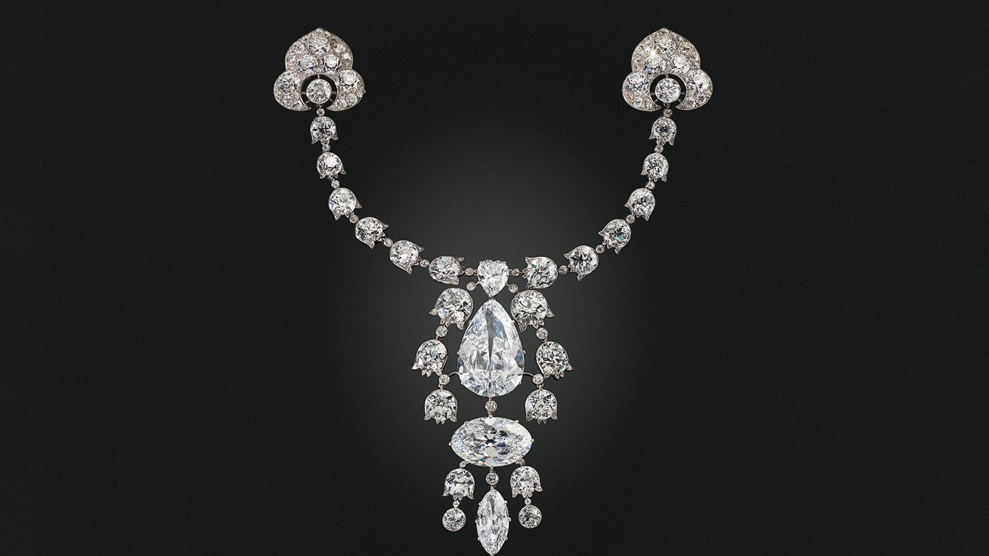 jewelry auctions: Cartier Belle Époque diamond devant-de-corsage brooch set with Golconda diamonds