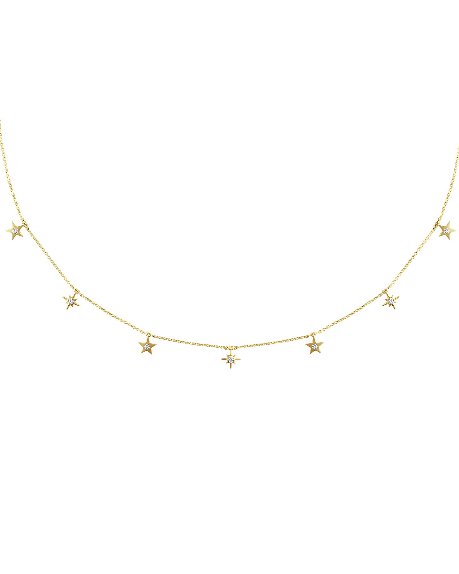 Yellow gold diamond necklace with star-shaped diamond accents.