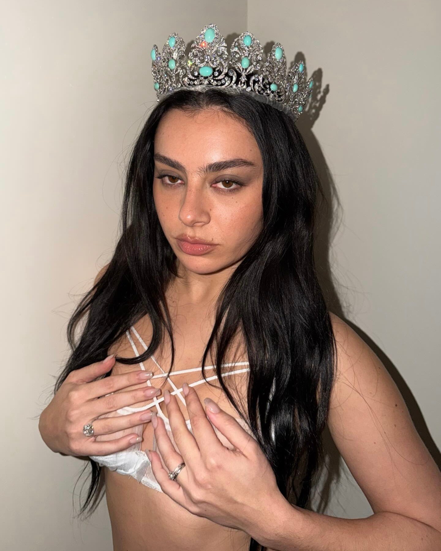 Charli XCX wore an antique Barron London diamond and turquoise tiara in an Instagram post on February 5, 2026.