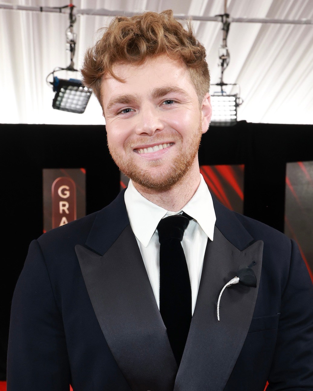 Alex Warren Wore Tiffany & Co. Jewelry to the Grammys 2026 Amapola brooch Elsa Peretti