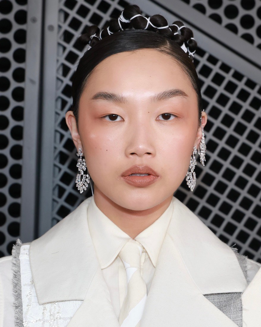 'KPop Demon Hunters' star Audrey Nuna wore diamond Messika chandelier earrings to walk the Grammys 2026 red carpet.