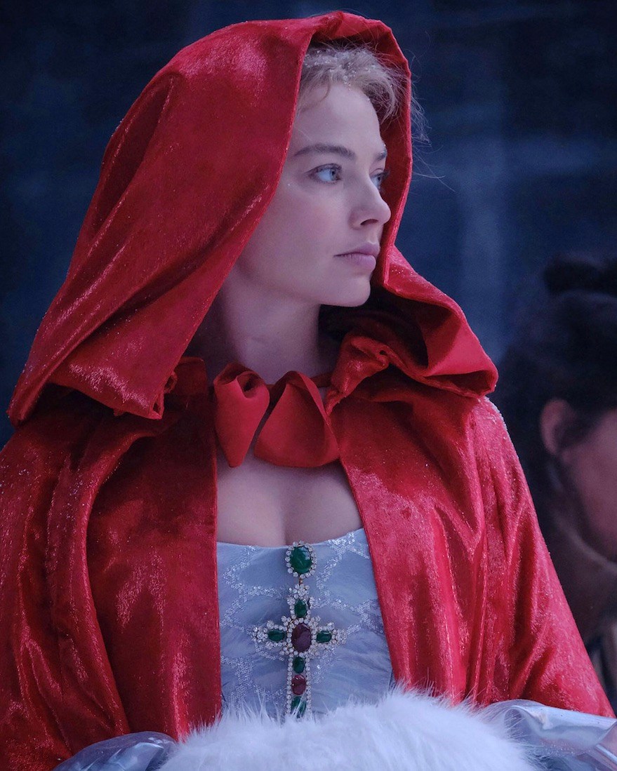 Margot Robbie wears a bejeweled cross as Catherine Earnshaw in Wuthering Heights (2026)