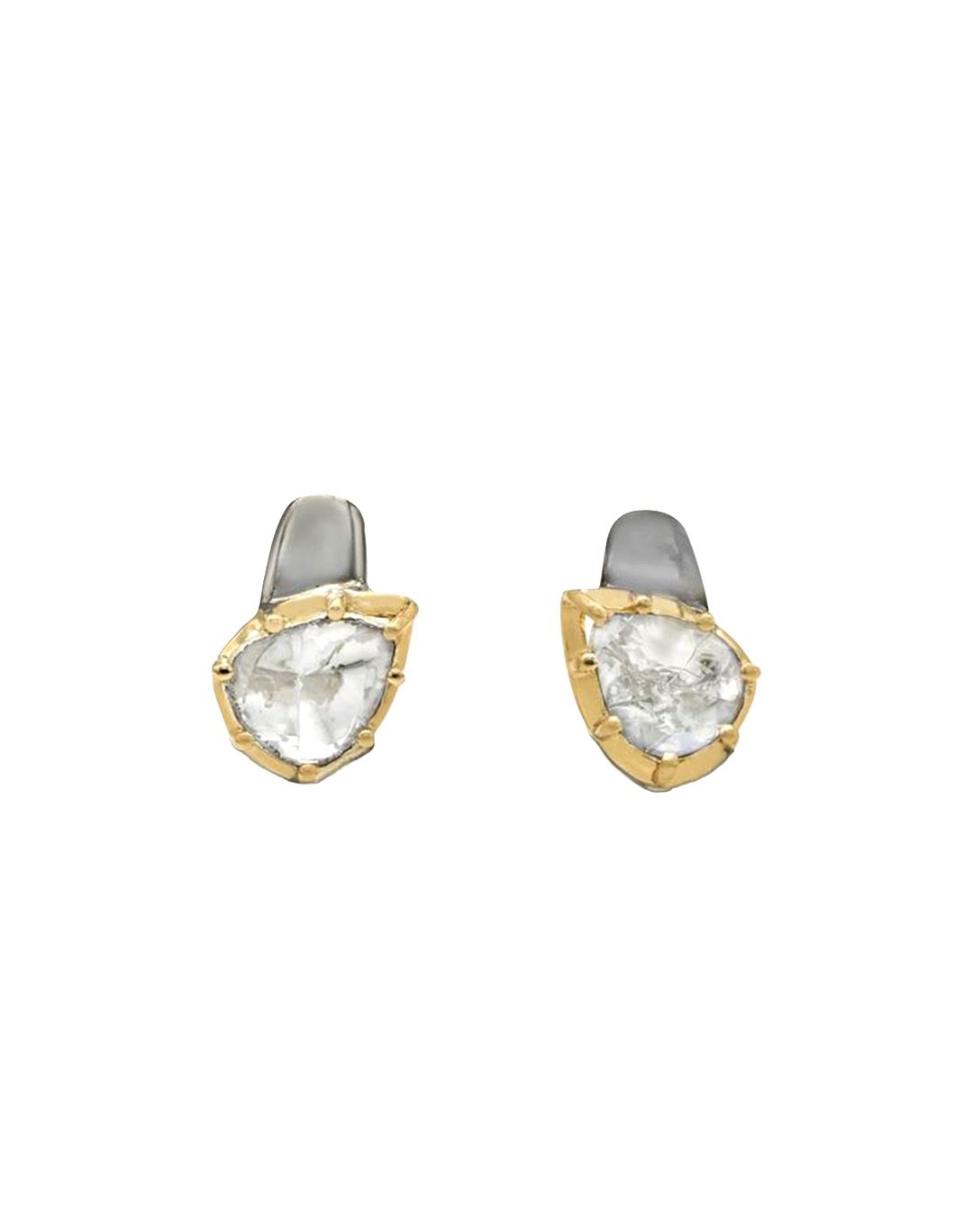 Pear-shaped diamond stud earrings.