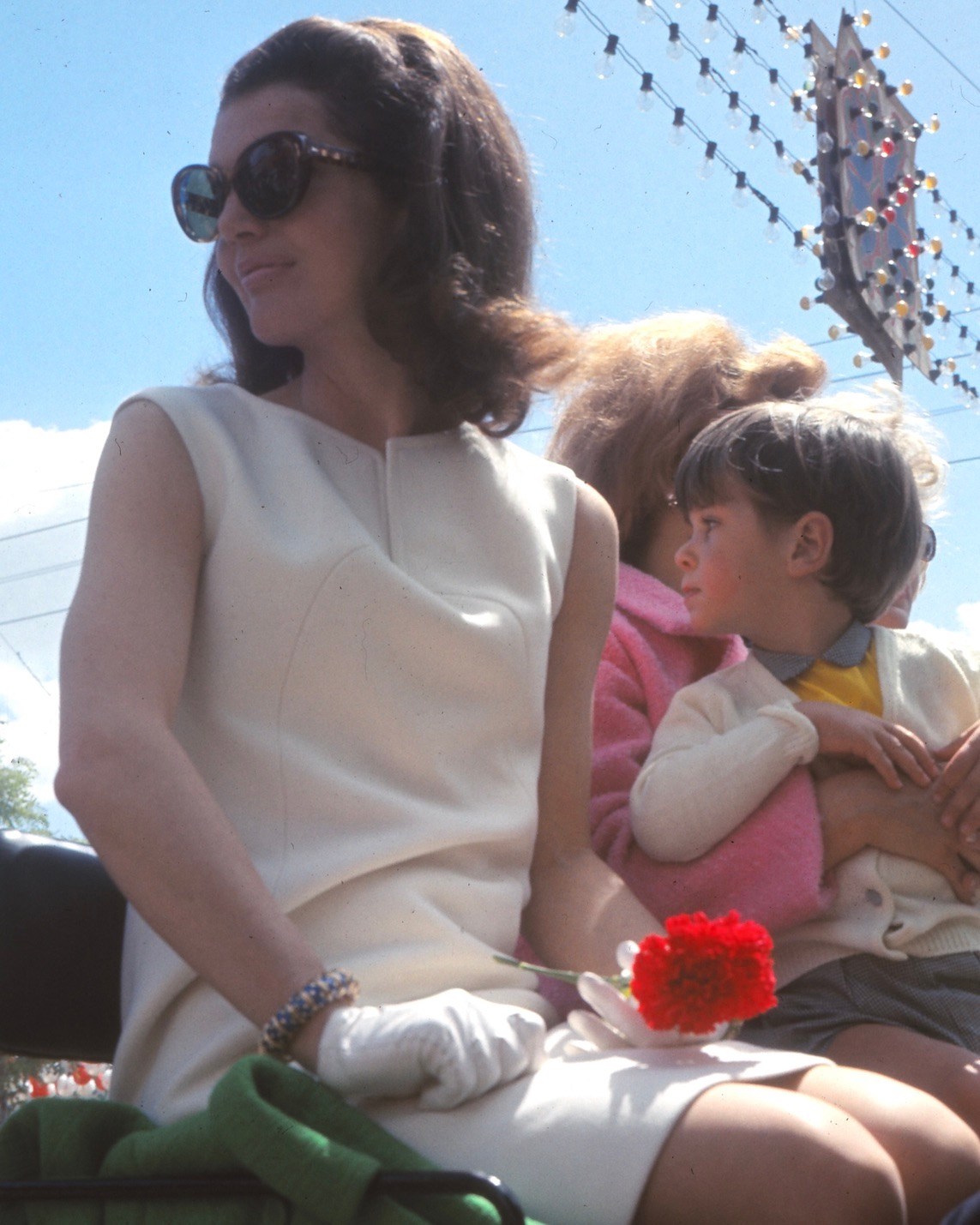 Jackie Kennedy wears Jean Schlumberger enamel Crosillon bracelets
