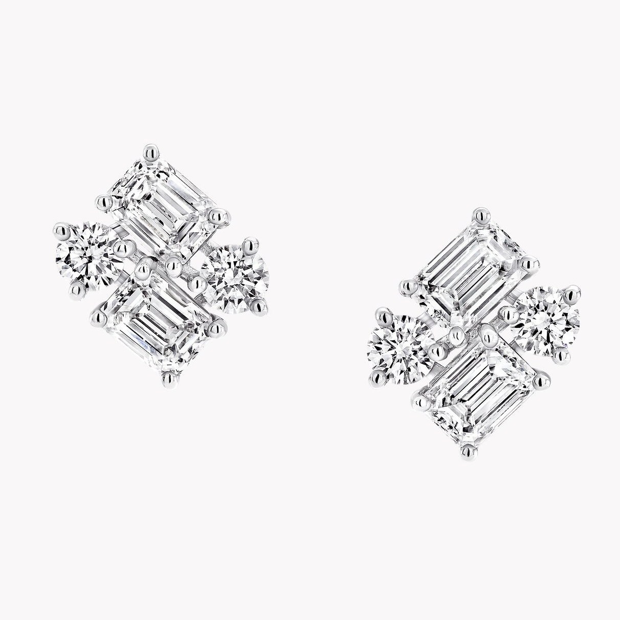 Graff Emerald Cut and Round Diamond Earrings, $29,300, graff.com