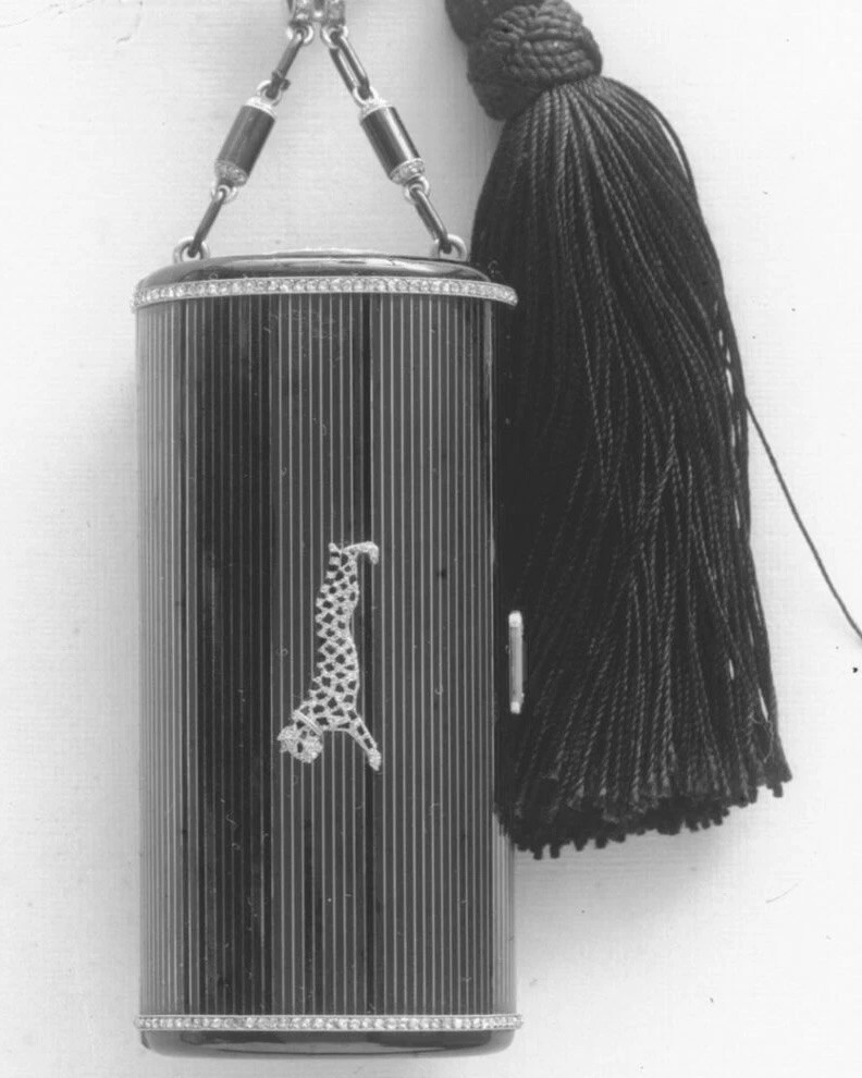 Vanity Case Ordered by Jeanne Toussaint in 1919. Gold and black Canton enamel with a panther motif in diamonds, platinum, and onyx