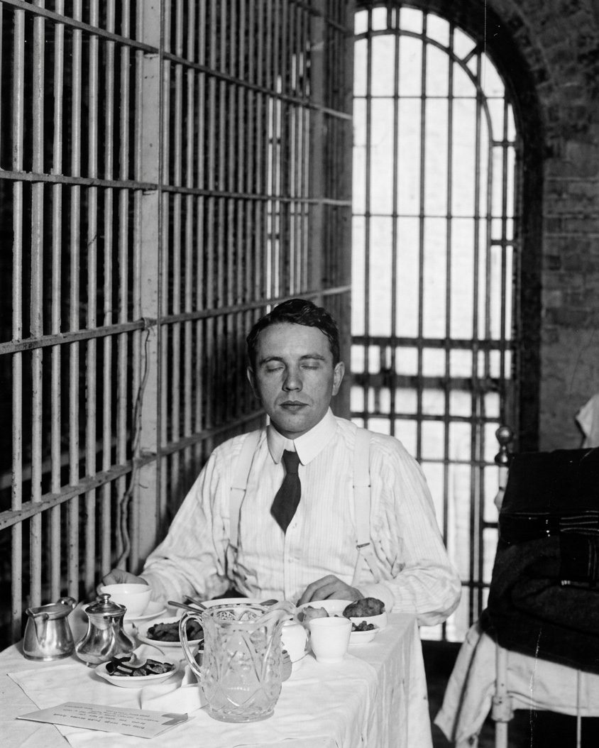 Harry K Thaw eating a meal supplied by Delmonico’s restaurant in his New York City jail cell