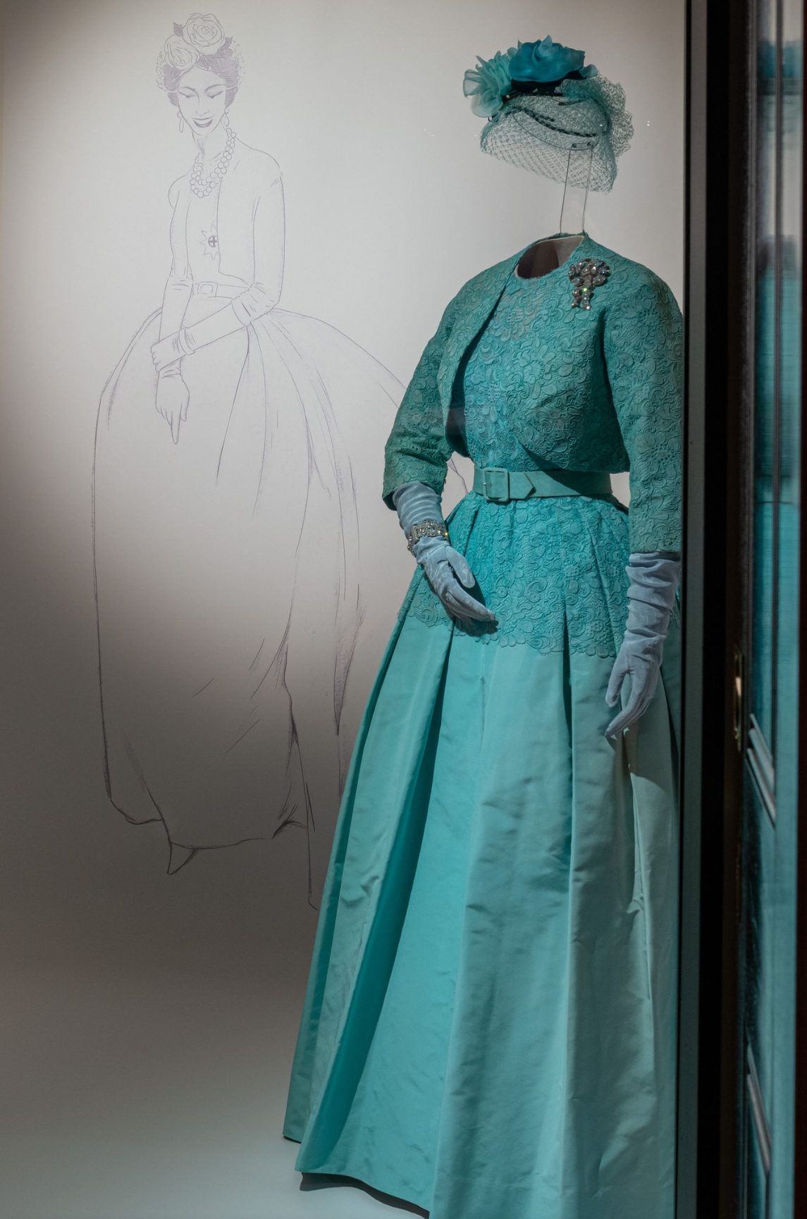 The ensemble Queen Elizabeth II wore to the 1960 wedding of her sister, Princess Margaret, displayed in Queen Elizabeth II: Her Life in Style.