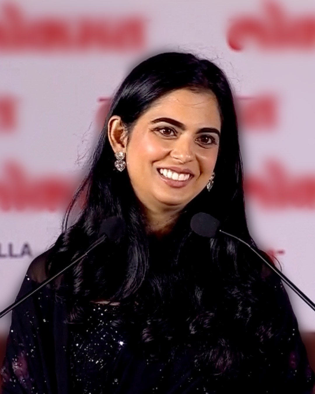 Isha and Nita Ambani wearing elegant diamond earrings and necklaces.