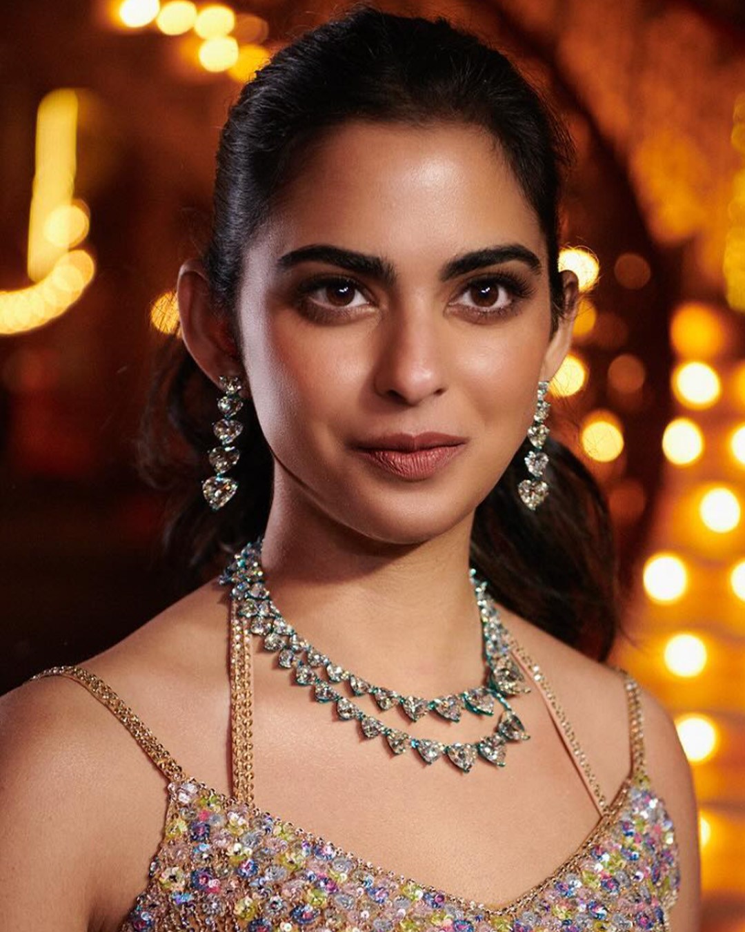 Nita Ambani wearing Isha Ambani’s repurposed heart-shaped diamond necklace.