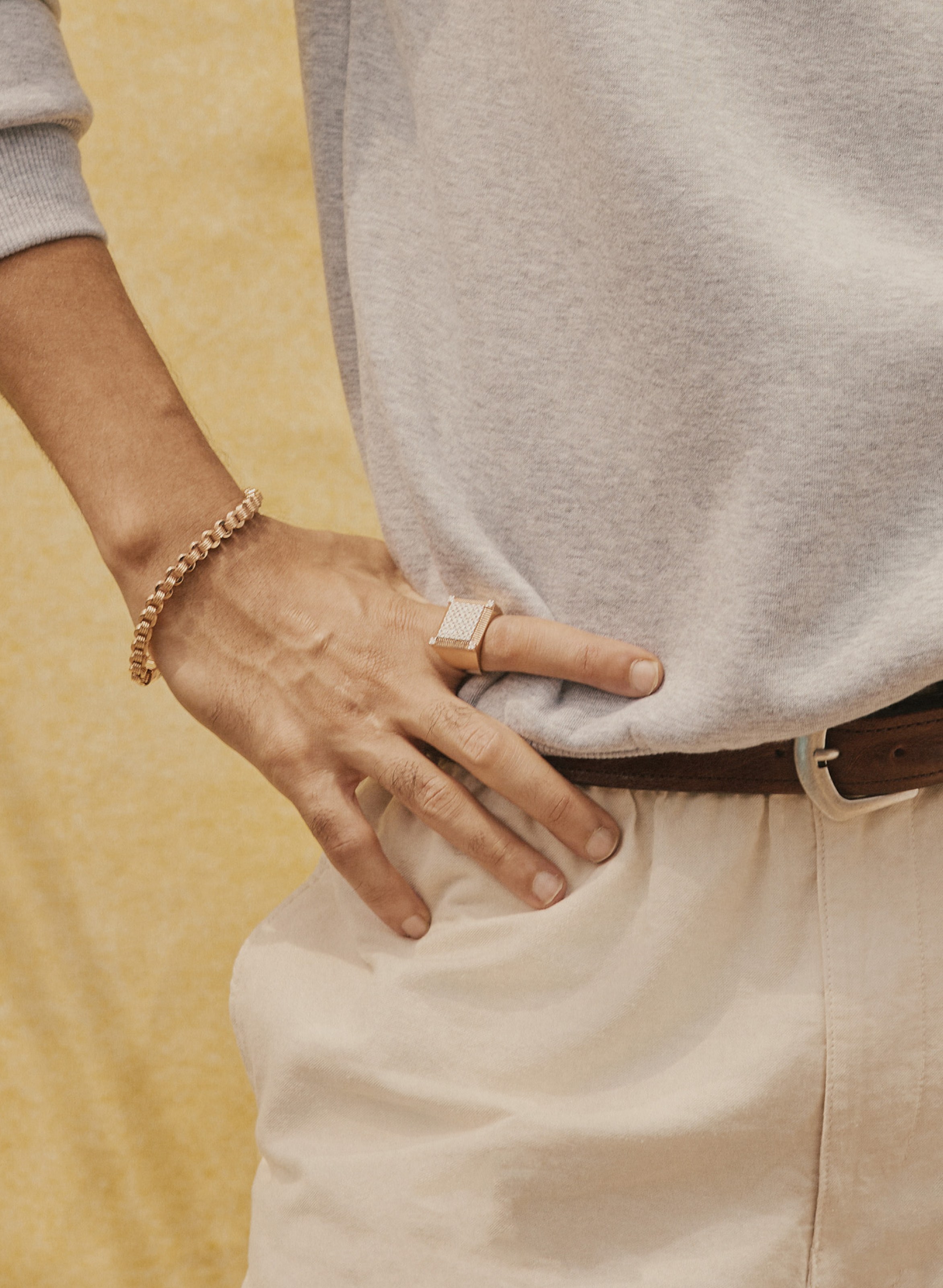 Rose gold diamond Cuban link bracelet and signet ring.