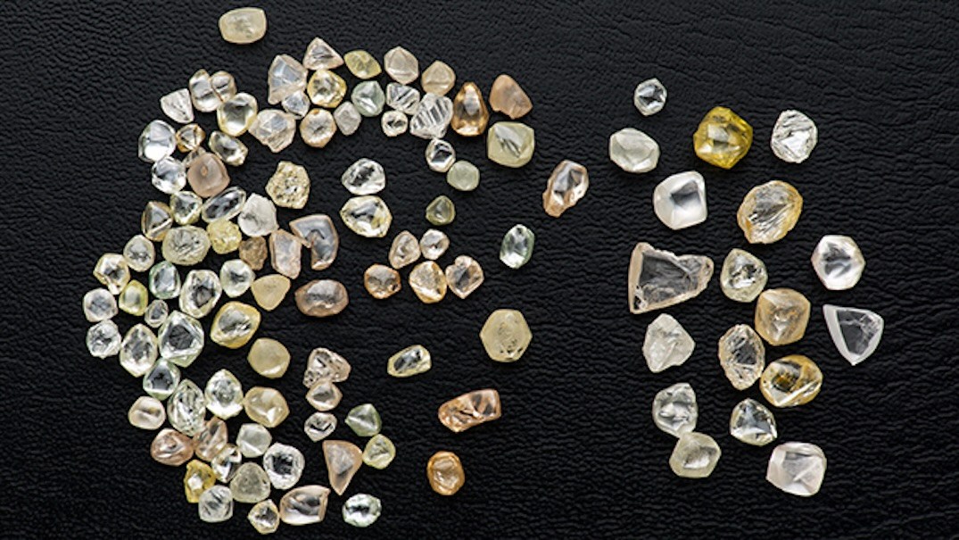 This selection of Brazilian diamonds, recovered from the Abaeté River in Minas Gerais, weighing a total of 77.82 carats, is typical of the material being found today in Brazil’s alluvial deposits. (Photo by Robert Weldon/GIA, courtesy of Giovani de Deus Borges.)