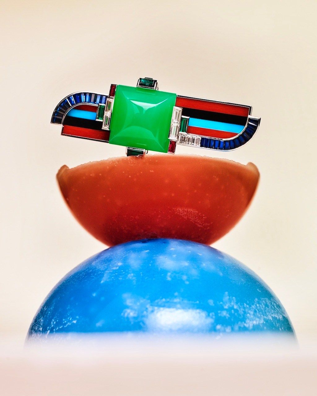 Fascinating Egypt Van Cleef & Arpels “Plume de Vie” clip set with emeralds, rubies, sapphires, coral, chrysoprase, turquoise, onyx, and diamonds, in white, rose, and yellow gold. (Photographed by Benjamin Bouchet for Only Natural Diamonds)