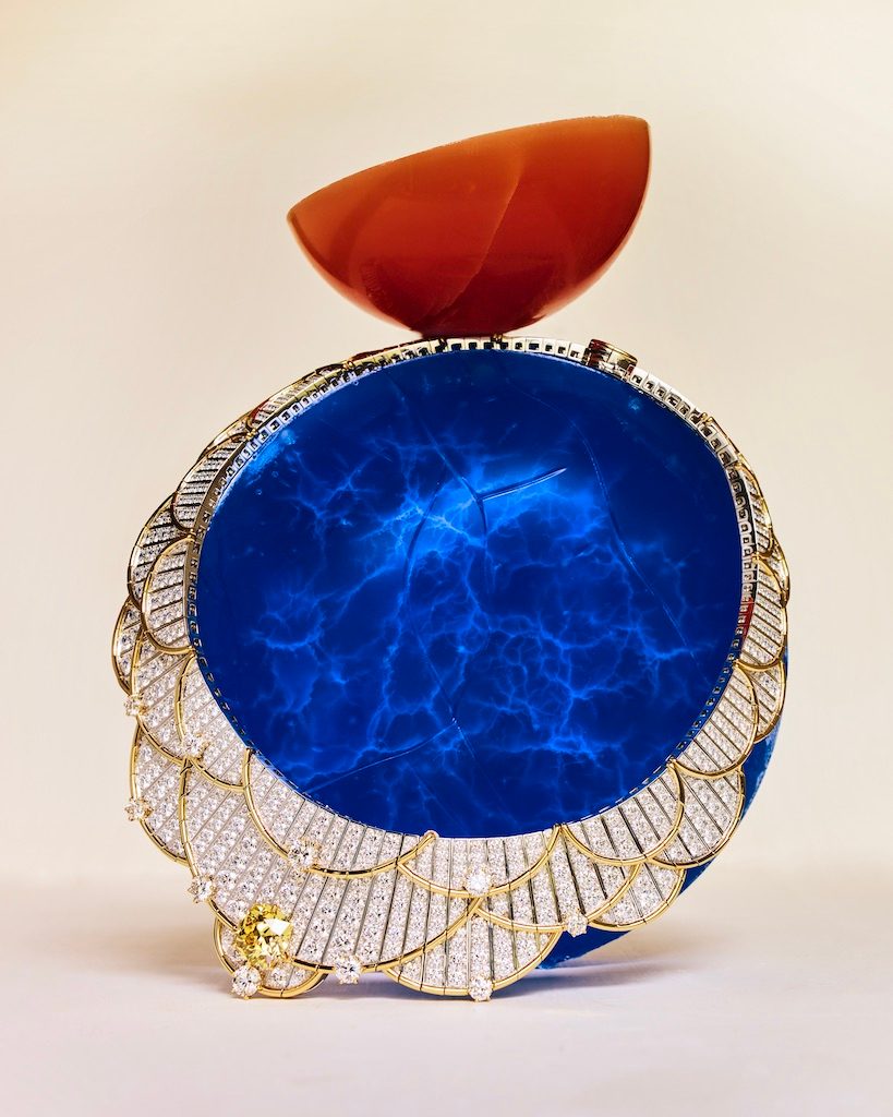 Egyptomania Van Cleef & Arpels “Beauté légendaire” necklace featuring a cushion-cut Fancy Vivid Yellow diamond of 10.02 carats, sapphires, and diamonds, set in white gold and yellow gold. (Photographed by Benjamin Bouchet for Only Natural Diamonds)