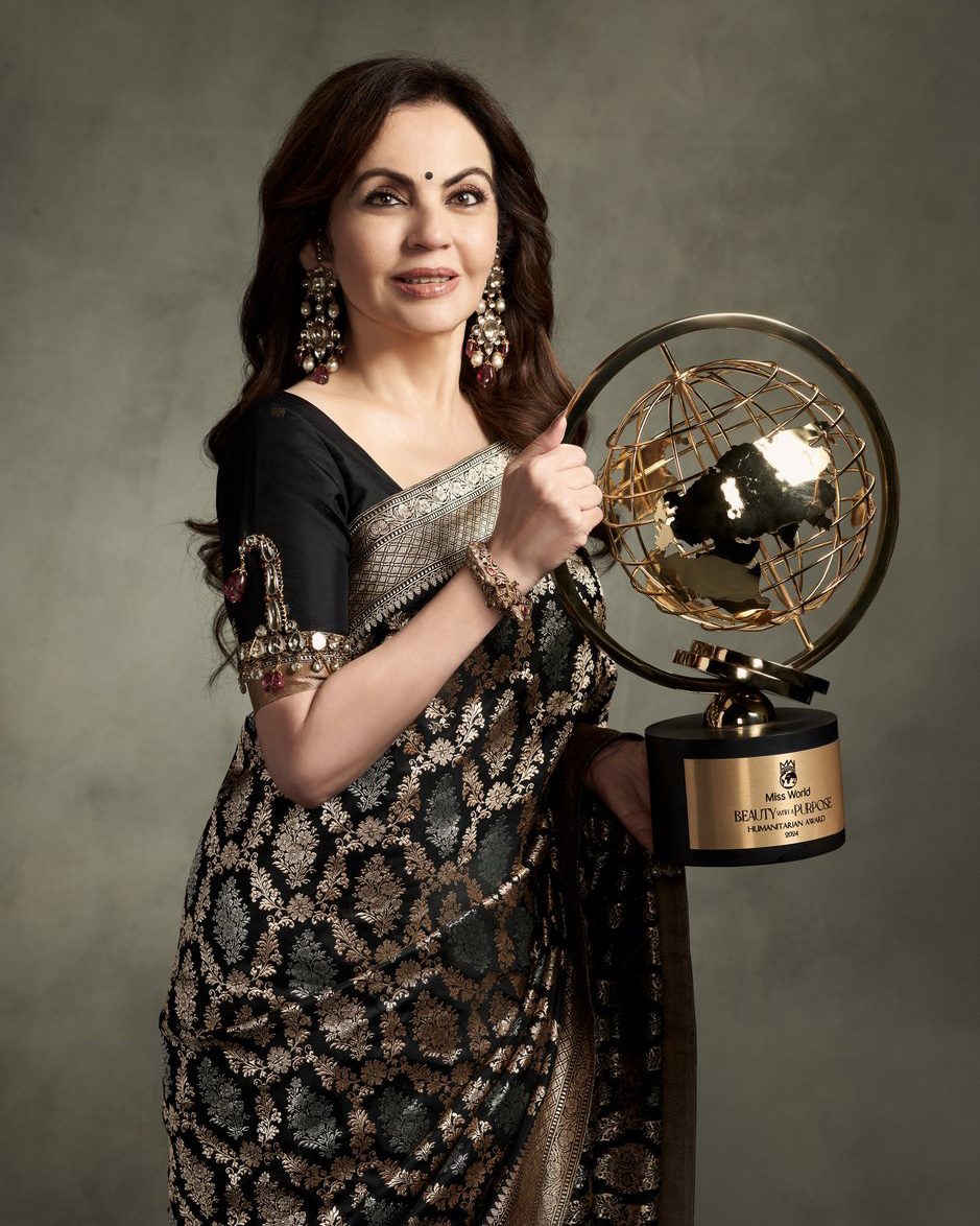 Nita Ambani receives the Beauty With a Purpose Humanitarian Award at the 71st Miss World Finals in Mumbai in 2024. (Courtesy of Reliance Foundation)
