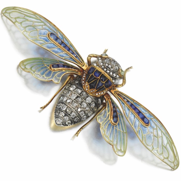 Gold, enamel, sapphire, and diamond cicada Boucheron brooch, circa the last quarter of the 19th century. Frédéric Boucheron's craftsmanship anticipates Lalique’s use of plique-à-jour enamel in his Art Nouveau creations, while here, Boucheron remains firmly anchored in the realistic naturalism of the 19th century. 
