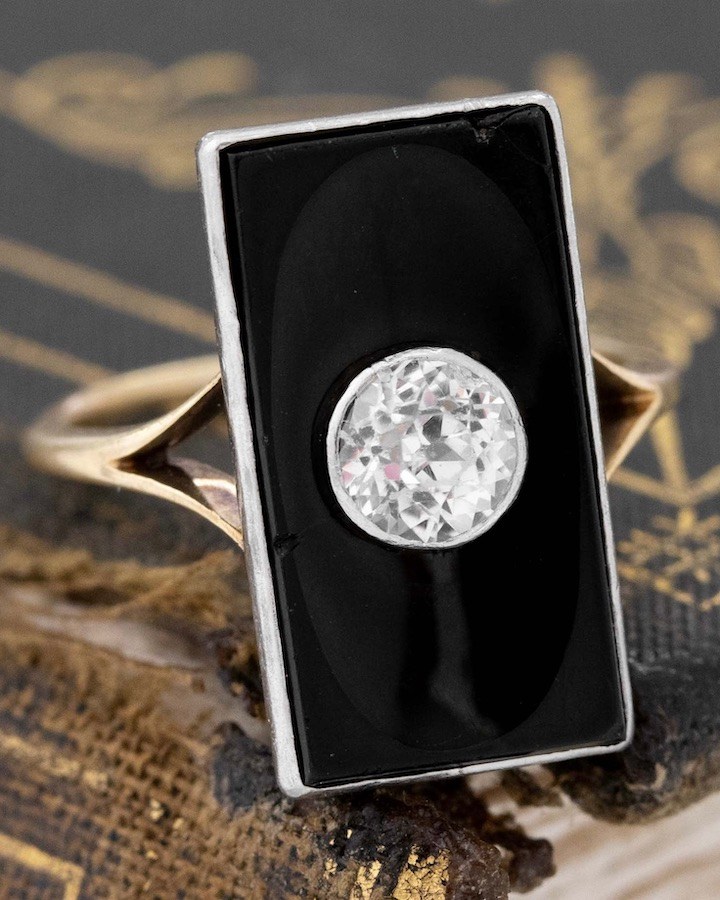 Antique Jubilee Cut White Sapphire and Onyx Dinner Ring, $2,200, jewelsbygrace.com