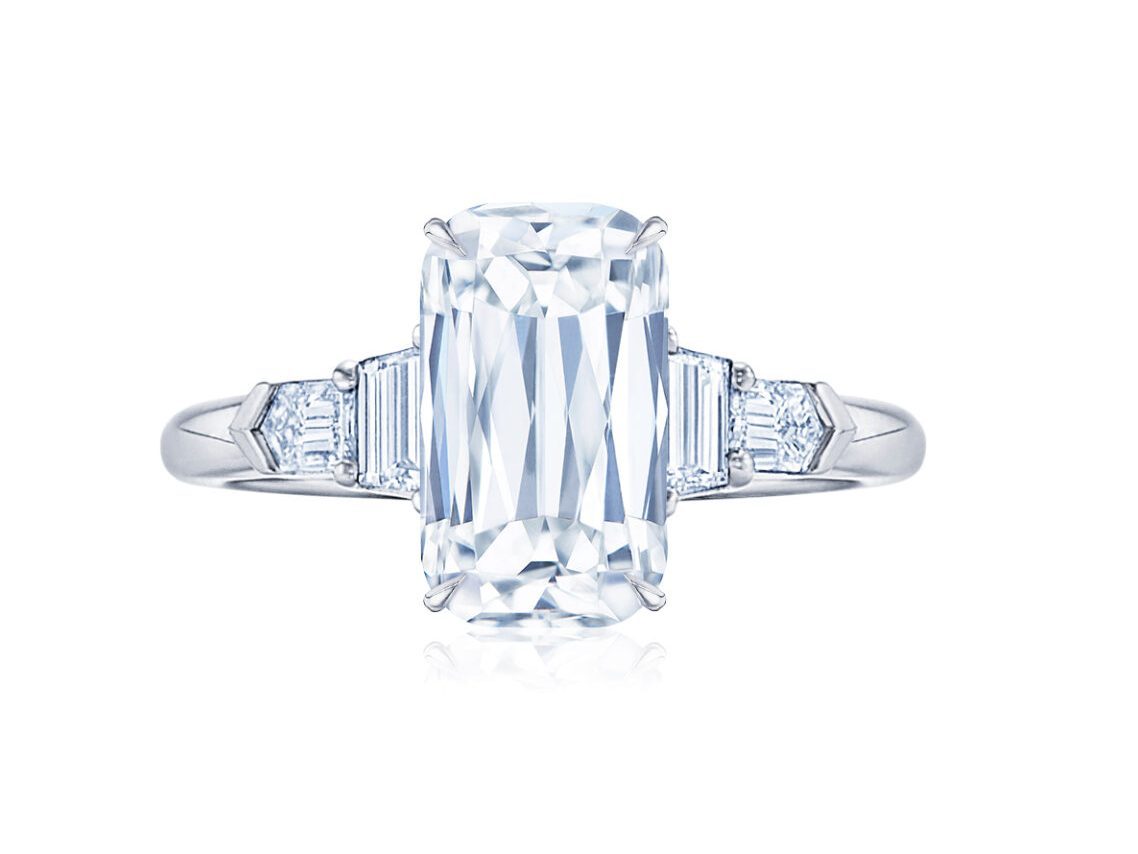 add side stones to make an engagement ring look bigger