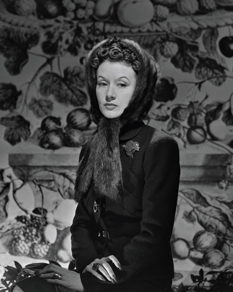 jewelry collectors Millicent Rogers wears her her heart-shaped brooch