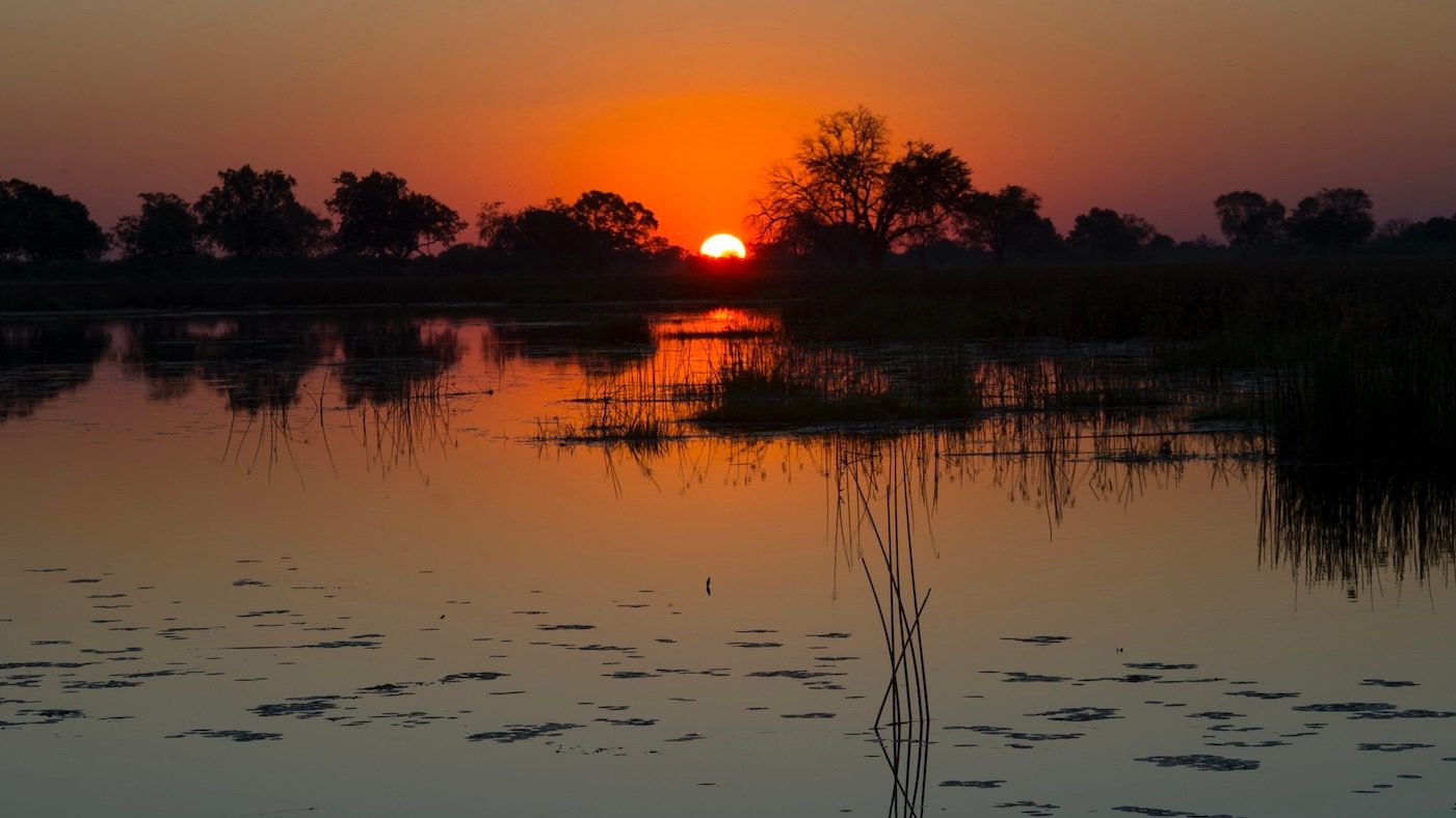Diamond Traceability Sun setting over the Okavango Delta in the northern part of Botswana on June 08, 2014.