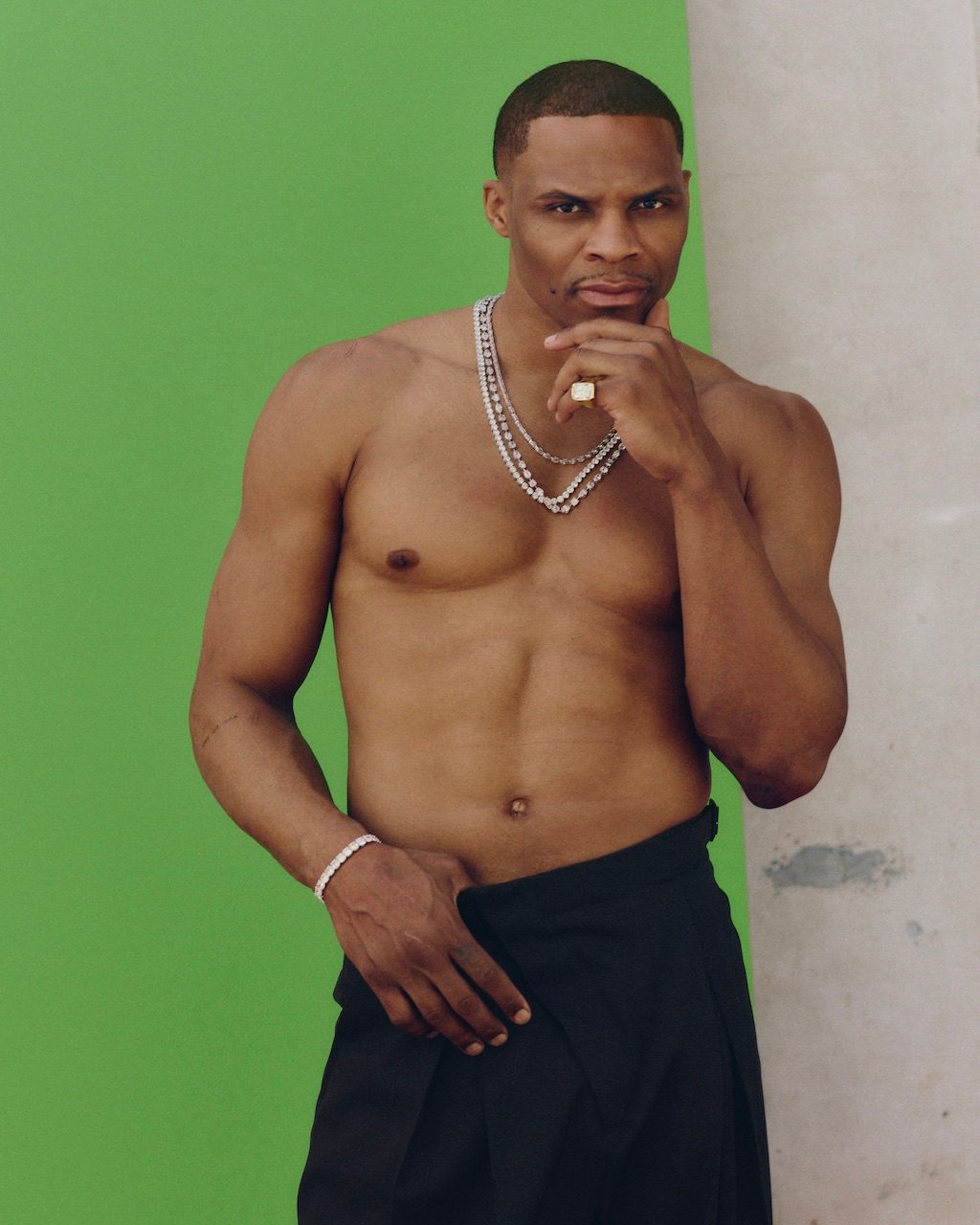 Basketball star shirtless Russell Westbrook wearing diamonds