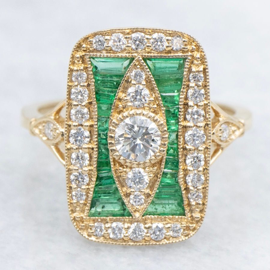 The McIntyre Emerald and Diamond Dinner Ring, $5,565, marketsquarejewelers.com