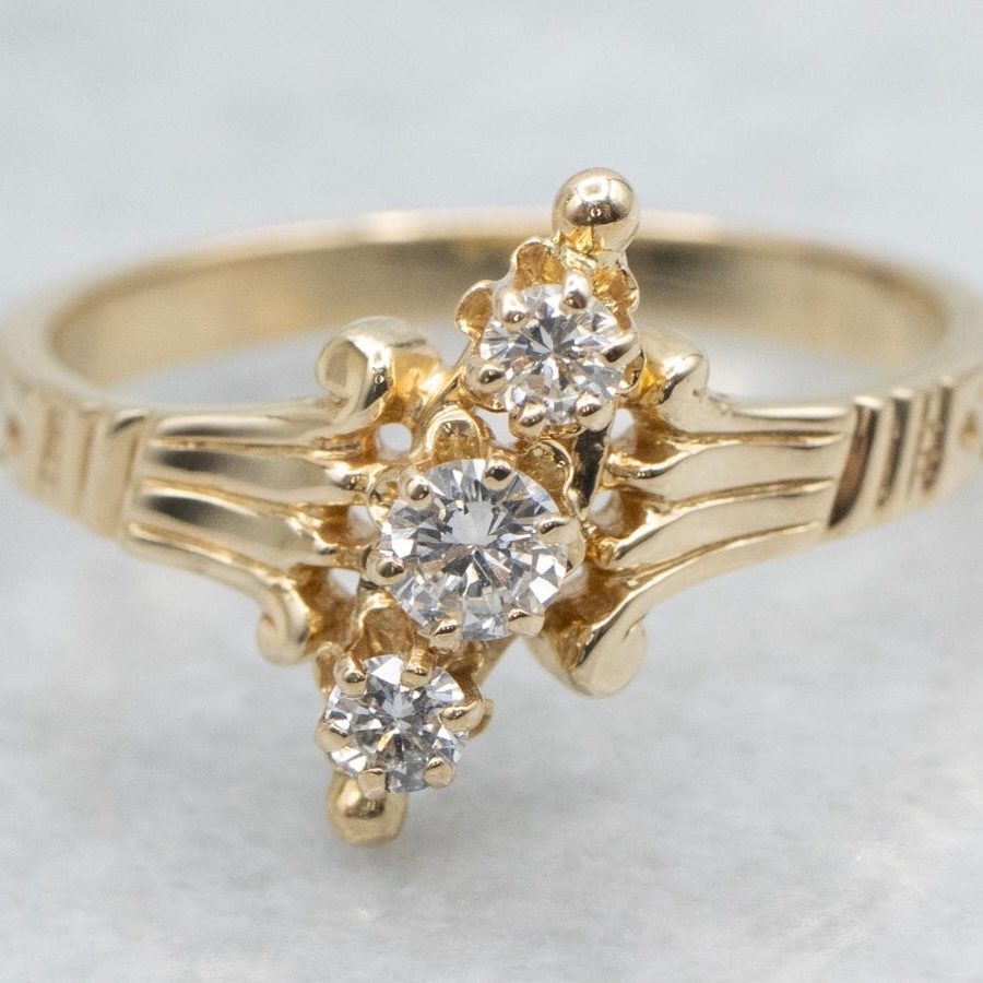Victorian Gold Triple Diamond Navette Dinner Ring, $1,965, marketsquarejewelers.com