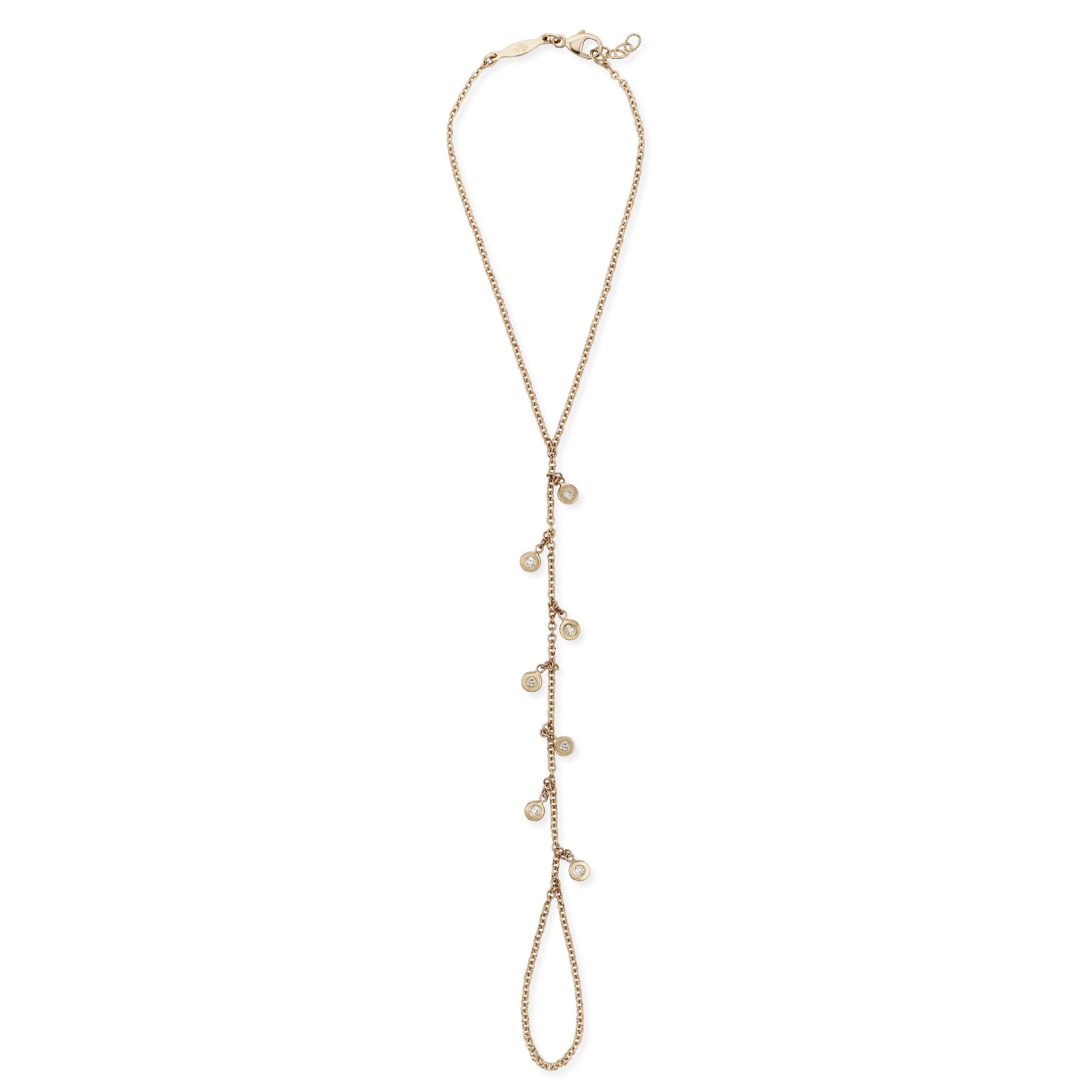 Diamond Hand Chain Jacquie Aiche 7 Diamond Shaker Finger Bracelet, $2,365, jacquieaiche.com