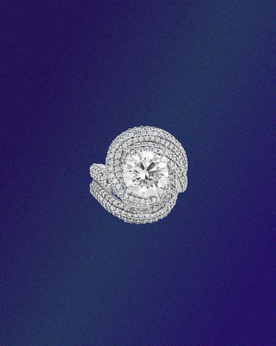 Pure Facets natural diamond statement ring in white gold.