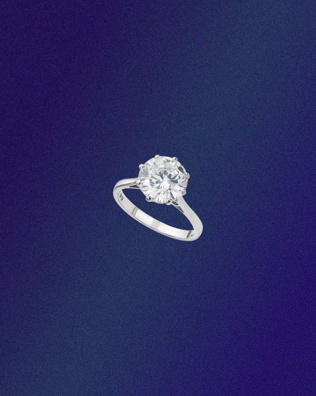 Jos Alukkas natural diamond solitaire ring in white gold.