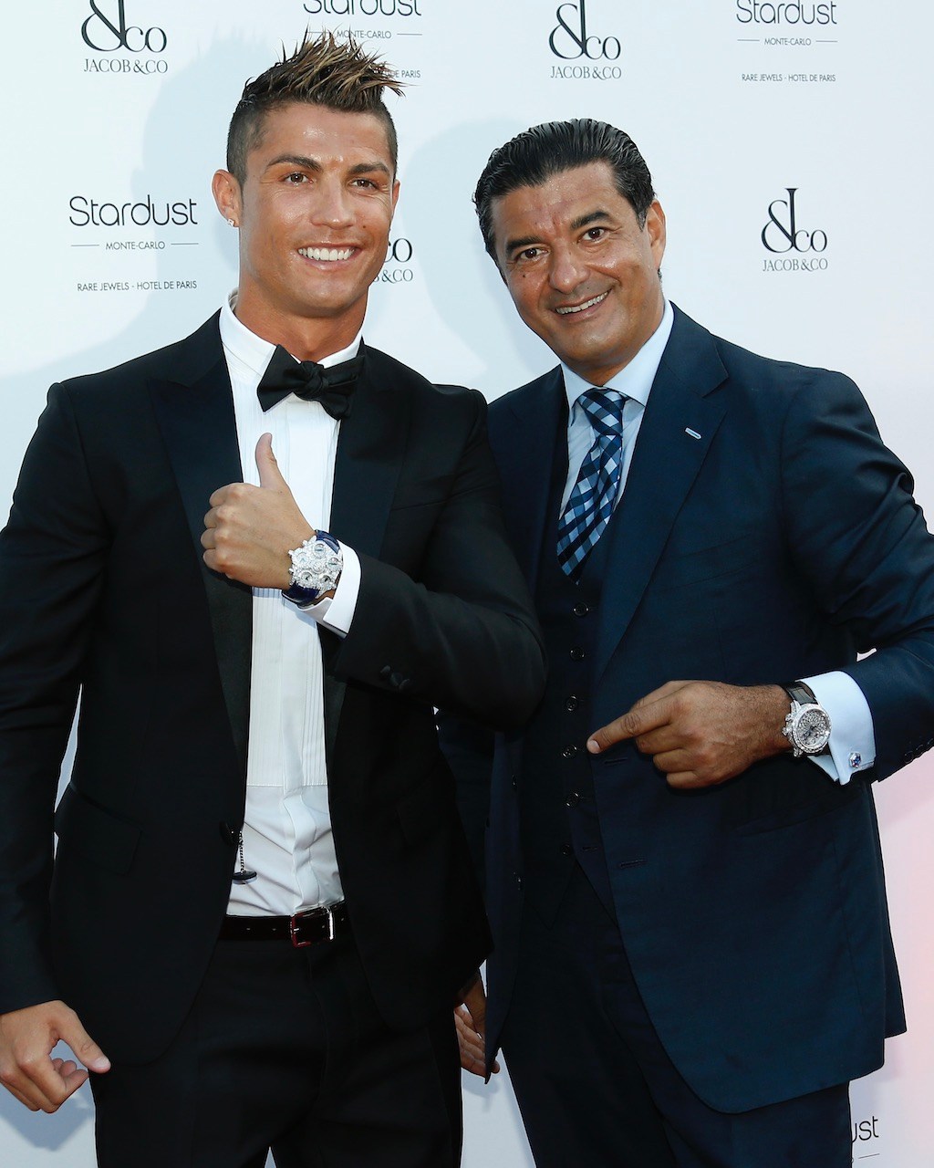 Portuguese football star Cristiano Ronaldo (L) poses with Bukharian-American jeweler and founder of "Jacob and Co", Jacob Arabo