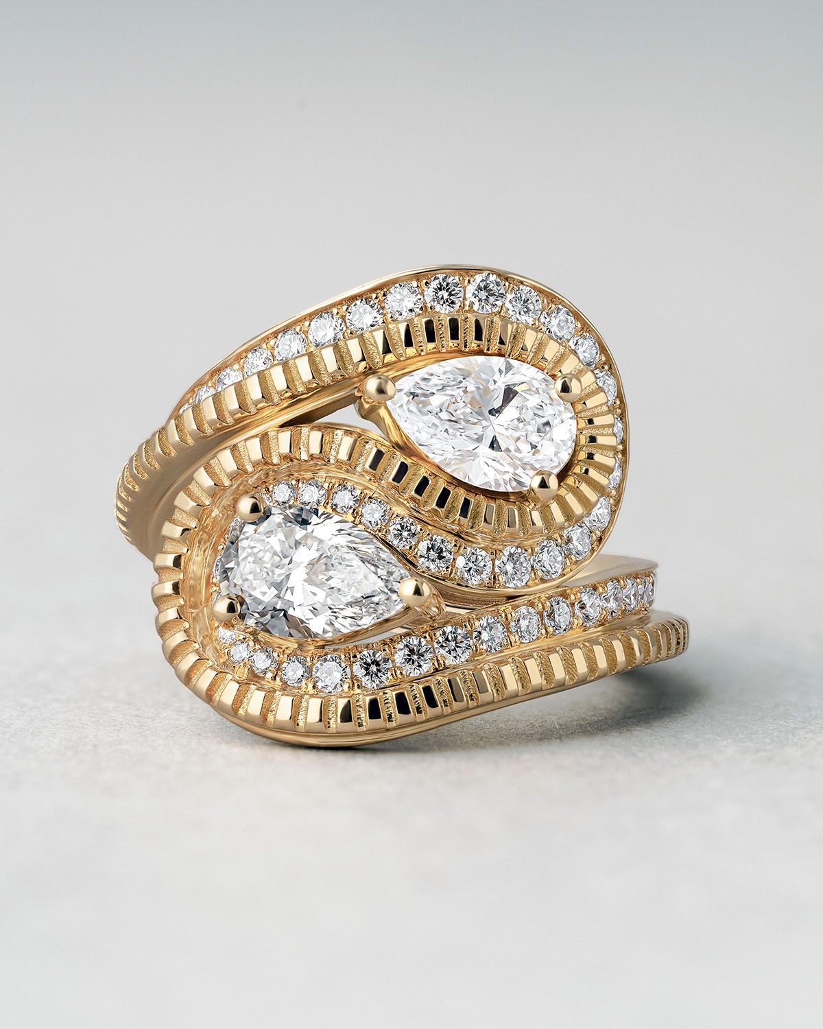 wavy ring with two diamonds