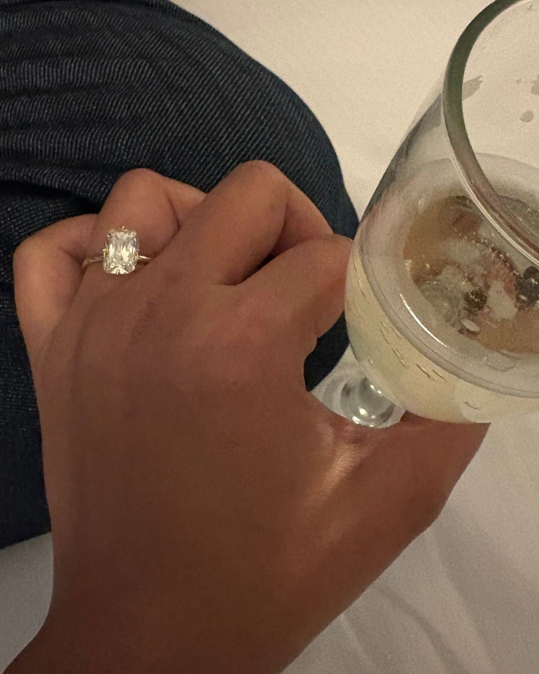 Dr. Chari Belmonte's warm diamond engagement ring