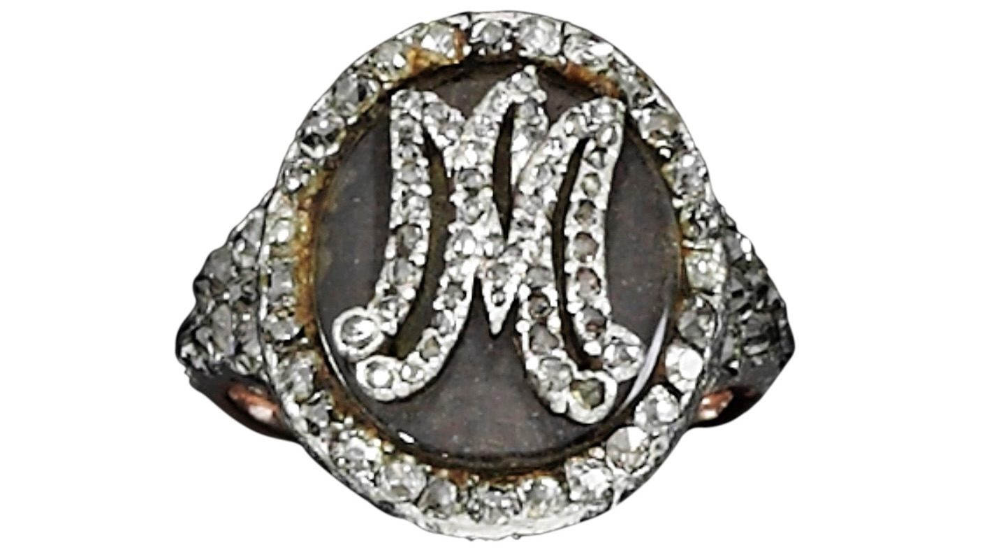 Marie Antoinette's Jewelry Diamond and Woven Hair ring with rose-cut diamond monogram MA for Queen Marie Antoinette. (Courtesy of Sotheby’s)