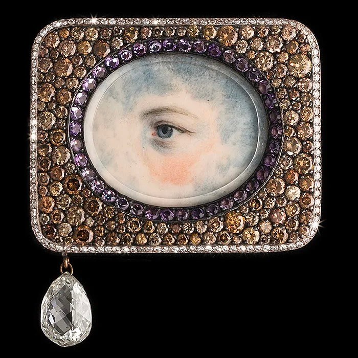 Antique Lover's Eye Miniature Brooch, set in an amethyst, brown and white diamonds frame and a briolette diamond, silver and gold, 1993, by JAR.