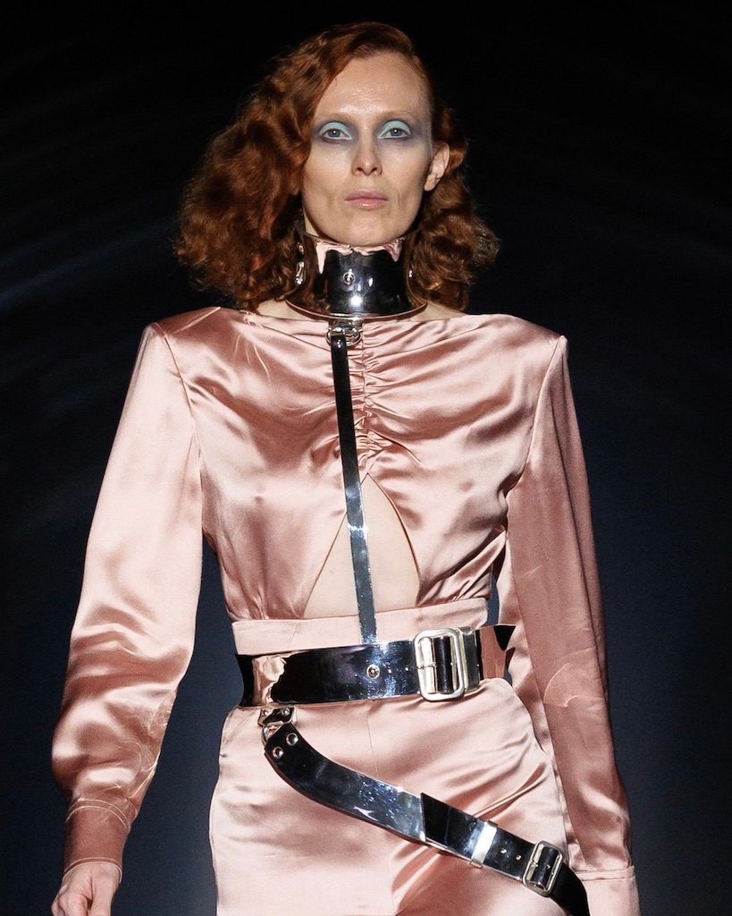 Supermodel Karen Elson wears a metal harness by Shaun Leane on the Alexander McQueen Spring/Summer 2027 runway during London Fashion Week. (Courtesy of Shaun Leane)